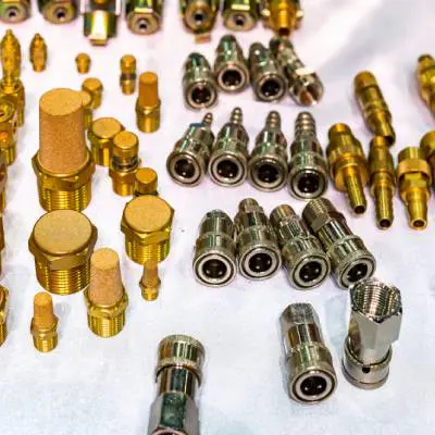 New Project - 2025-04-11T104418.916 A table with many different types of brass fittings.